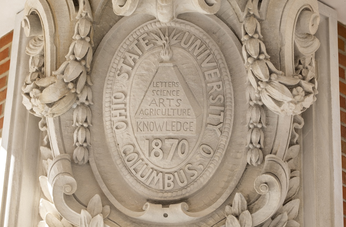 Picture of stonework depicting the seal of The Ohio State University.