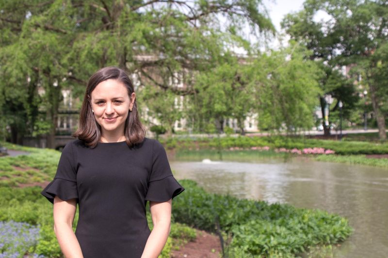 Patti Zettler standing in front of Mirror Lake on the Ohio State campus.