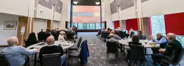 Group of emeritus faculty attending a lecture