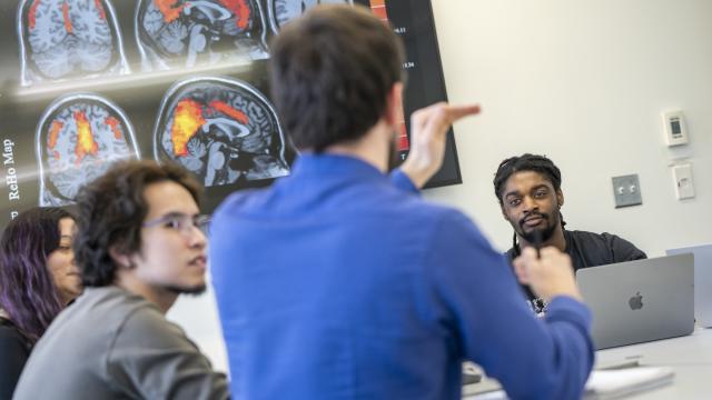 Faculty discuss an important topic.