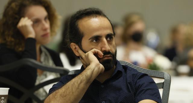 New faculty members listen intently during 2022 New Faculty Orientation.