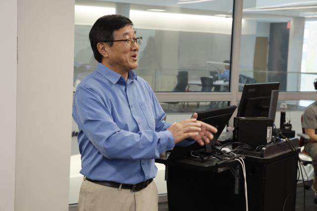 Alan Luo in a classroom