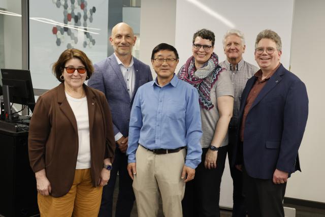 Alan Luo with college and university leadership