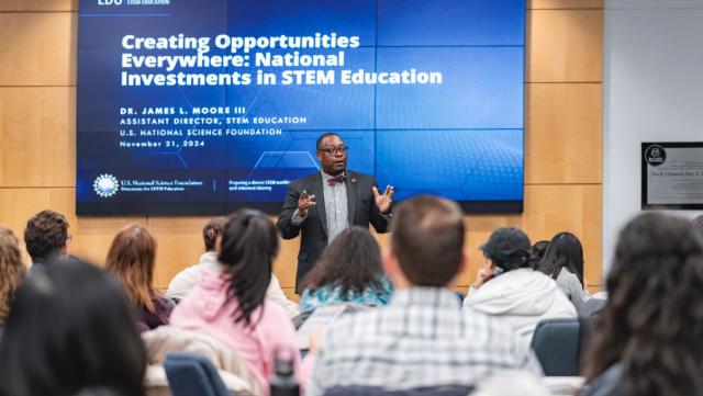 James Moore III presenting to a group