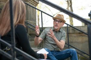 Job #21_2892369 Ohio State Newark faculty member David Ruderman has created a therapeutic way of using poetry. Ruderman is incorporating poetry writing into the recovery plan of individuals recovering from drug addiction in a Licking County Day Court Program. He talks to Holly about her writing on the steps of the Newark Ohio courthouse. Ohio State Alumni Magazine 04/14/2021 Photo by Jo McCulty The Ohio State University