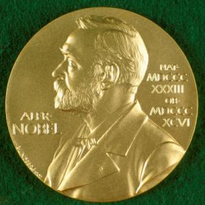 The Nobel medal, featuring the likeness of Alfred Nobel.